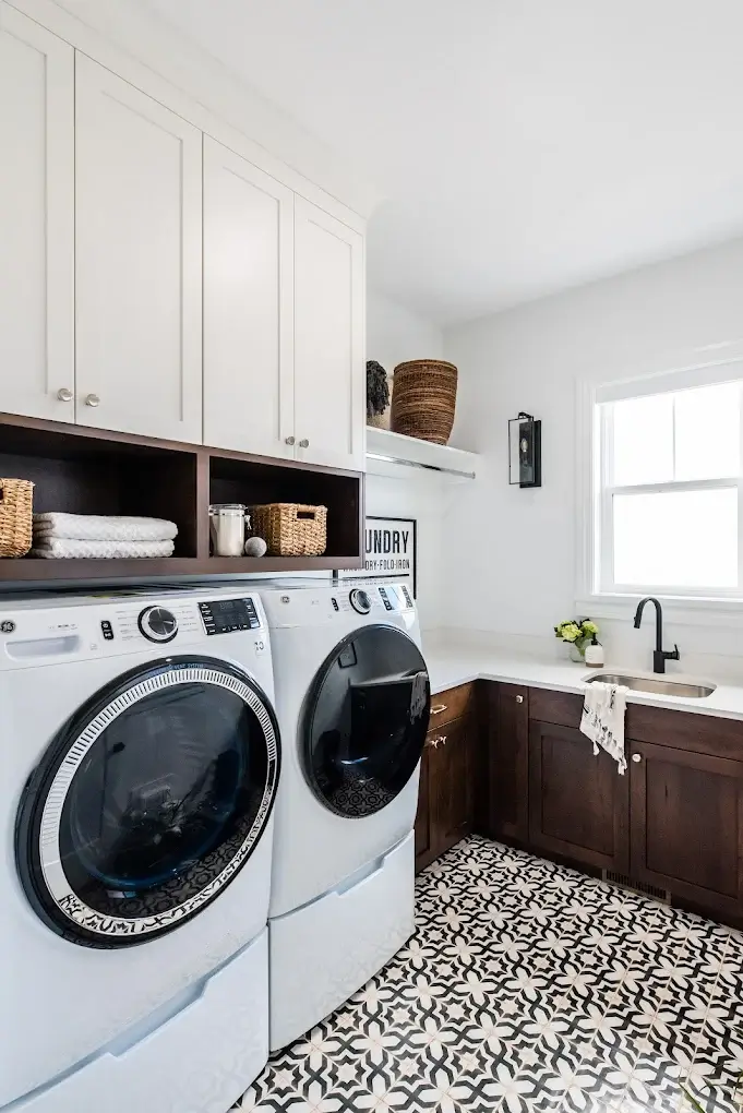 Bright laundry room with patterned tile floor